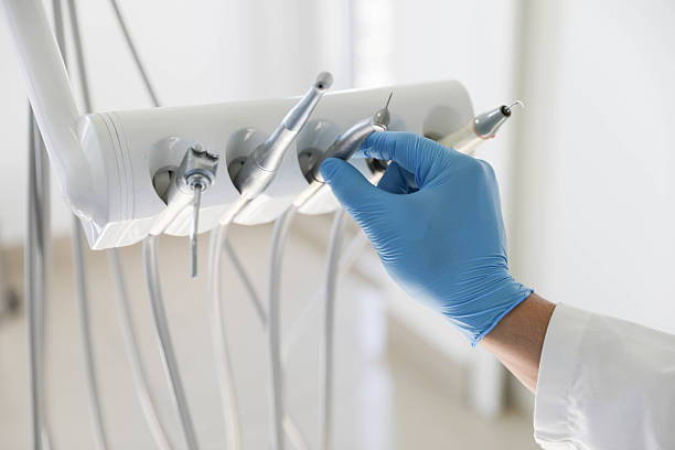 Professional Teeth Whitening technician working in Harris Hill, NY
